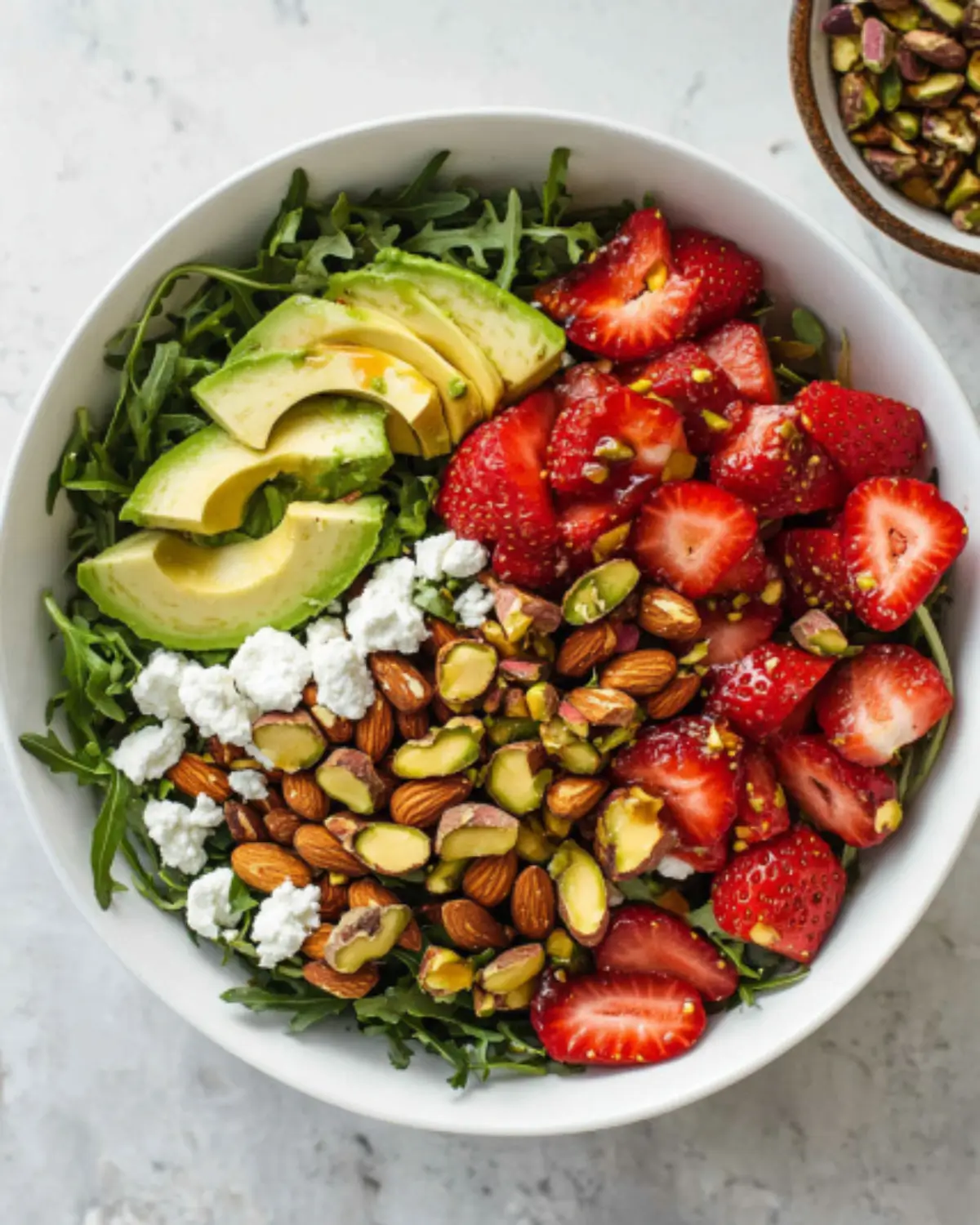 Strawberry Crunch Salad with Avocado, Pistachios & Goat Cheese