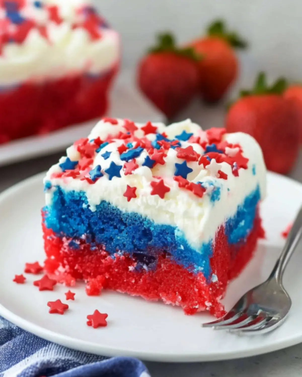 Patriotic Poke Cake Recipe with Whipped Cream and Sprinkles