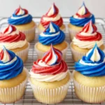4th of July vanilla cupcakes with patriotic buttercream swirl and text overlay