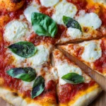 Freshly baked Margherita pizza with bubbling mozzarella, tomato sauce, and fresh basil on a wooden board