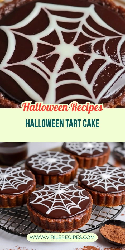 Halloween chocolate tart cakes with spiderweb icing designs on top of glossy ganache, styled on a wire rack.