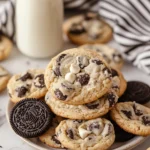 Close-up of cookies and cream cookies with white chocolate chips in a white bowl on a marble surface