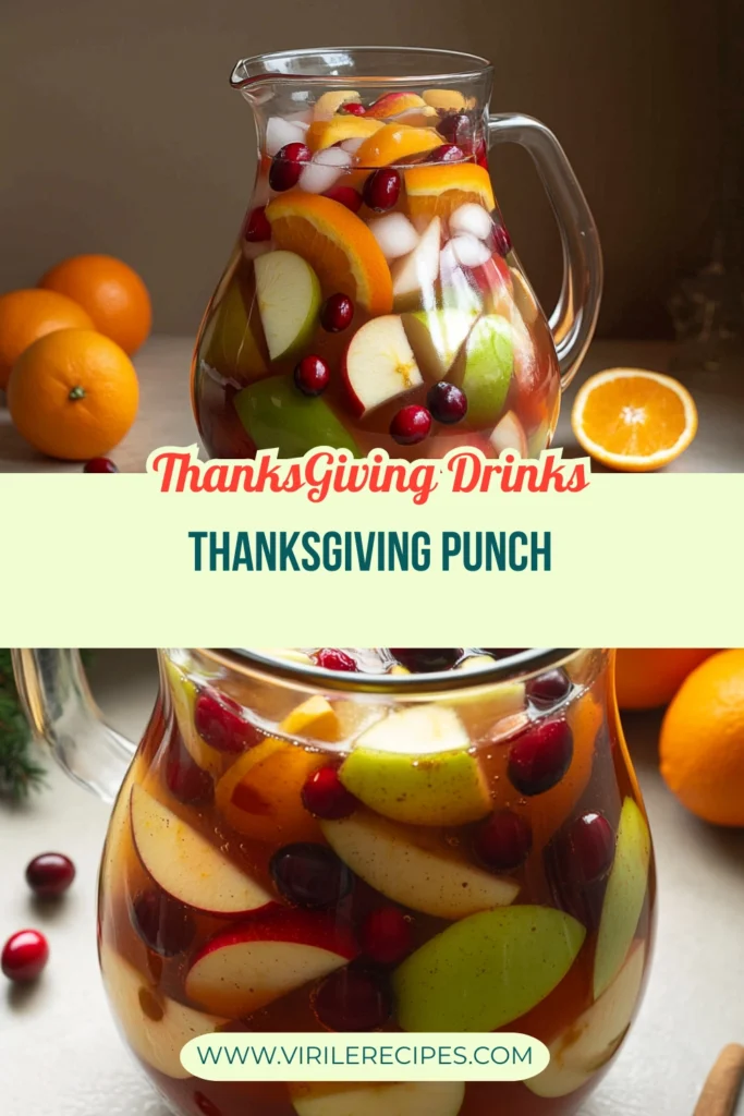 Glass pitcher of Thanksgiving punch with apples, oranges, cranberries, and ice surrounded by fresh fruit.