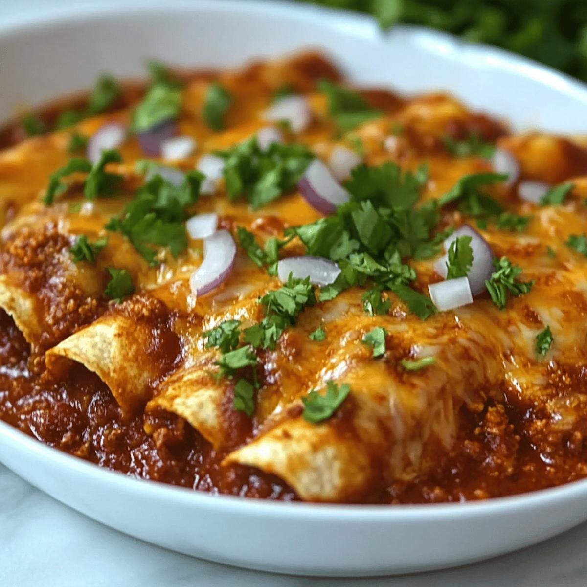 Cheesy Chili Enchiladas