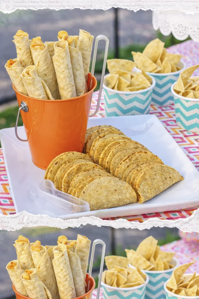 Colorful Party Snack Table with Wraps, Sandwiches, and Layered Dessert Cups